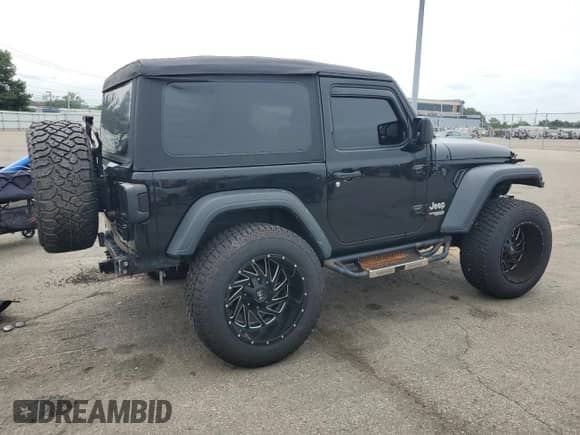 2018 Jeep Wrangler Sport with VIN 1C4GJXAG5JW138647, listed as a Copart auction lot 63102055 with 86,252 mi miles and Salvage title. Bid and sale history available at DreamBid. Image 3.