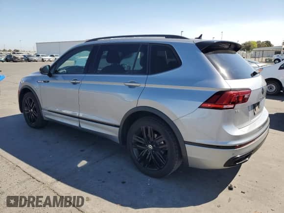 2022 Volkswagen Tiguan SE R-Line Black с VIN 3VVCB7AX2NM008117, выставлен на аукционе Copart как лот 70761905 с пробегом 138 041 миль миль и Чистый • Clean title. История ставок и продаж доступна на DreamBid. Изображение 2.