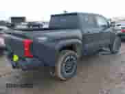 2024 Toyota Tacoma SR5 with VIN 3TMLB5JNXRM055645, listed as a IAAI auction lot 41208771 with 984 mi miles and . Bid and sale history available at DreamBid. Image 4.
