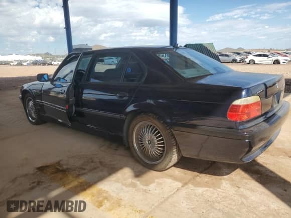 2001 BMW 7 Series 740iL with VIN WBAGH83491DP25964, listed as a Copart auction lot 85124625 with 106,541 mi miles and Salvage title. Bid and sale history available at DreamBid. Image 2.