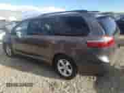 2015 Toyota Sienna LE with VIN 5TDKK3DC8FS611280, listed as a Copart auction lot 84606345 with 217,900 mi miles and Salvage title. Bid and sale history available at DreamBid. Image 2.