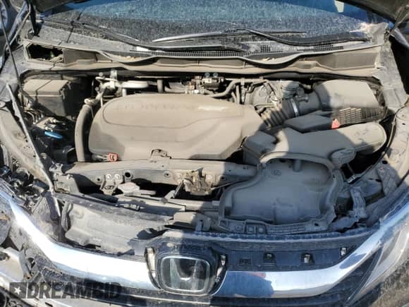 2020 Honda Odyssey with VIN 5FNRL6H4XLB502013, listed as a Copart auction lot 60472595 with 89,742 mi miles and Salvage title. Bid and sale history available at DreamBid. Image 12.