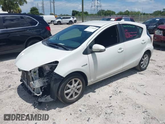 2015 Toyota Prius One z VIN JTDKDTB33F1087207, wystawiony jako IAAI lot #42776015 z przebiegiem 153 820 mil mil oraz . Historia ofert i sprzedaży dostępna na DreamBid. Obrazek 2.