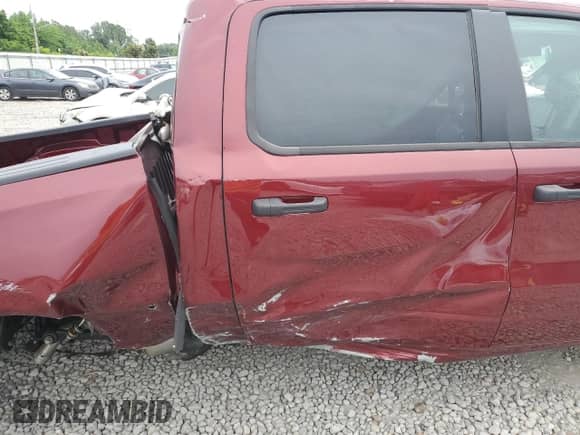 2025 Ram 1500 Tradesman with VIN 1C6RRFGG8SN601592, listed as a Copart auction lot 57250265 with Not provided miles and Salvage title. Bid and sale history available at DreamBid. Image 11.