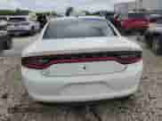 2018 Dodge Charger Police z VIN 2C3CDXAGXJH243242, wystawiony jako Copart lot #71091295 z przebiegiem 143 708 mil mil oraz Czysty tytuł • Clean title. Historia ofert i sprzedaży dostępna na DreamBid. Obrazek 6.