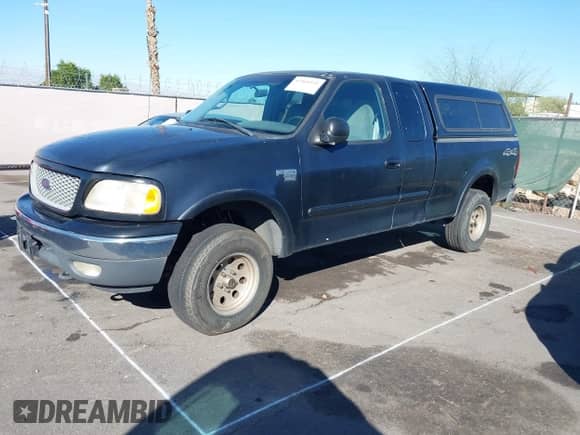 2000 Ford F-150 XL with VIN 1FTRX18W1YNC02247, listed as a IAAI auction lot 43464551 with Not provided miles and . Bid and sale history available at DreamBid. Image 2.
