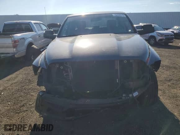 2018 Ram 1500 Tradesman z VIN 1C6RR6FG9JS229598, wystawiony jako Copart lot #70298915 z przebiegiem 99 942 mil mil oraz Szkoda całkowita • Salvage title. Historia ofert i sprzedaży dostępna na DreamBid. Obrazek 5.