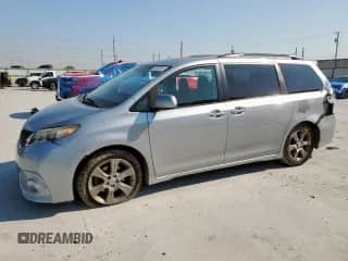 2011 Toyota Sienna SE with VIN 5TDXK3DC7BS049081, listed as a Copart auction lot 80009035 with 155,423 mi miles and Salvage title. Bid and sale history available at DreamBid. Image 1.