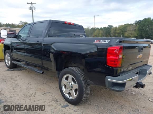 2015 Chevrolet Silverado 2500HD LT with VIN 1GC1KVEG9FF152026, listed as a IAAI auction lot 43427334 with 214,348 mi miles and . Bid and sale history available at DreamBid. Image 3.
