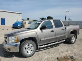 2013 Chevrolet Silverado 1500 LT with VIN 3GCPKSE70DG184710, listed as a Copart auction lot 67908285 with 163,730 mi miles and Salvage title. Bid and sale history available at DreamBid. Image 1.
