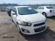 2014 Chevrolet Sonic LTZ with VIN 1G1JE5SB6E4132271, listed as a IAAI auction lot 41867508 with 115,116 mi miles and . Bid and sale history available at DreamBid. Image 1.