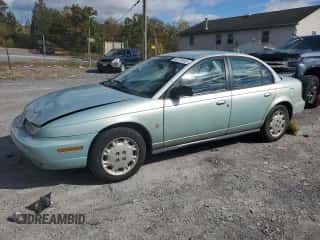 1997 Saturn SL with VIN 1G8ZK5274VZ271990, listed as a Copart auction lot 87279155 with 147,825 mi miles and Salvage title. Bid and sale history available at DreamBid. Image 1.