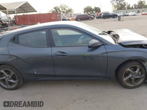 2019 Hyundai Veloster 2.0 with VIN KMHTG6AF3KU019955, listed as a IAAI auction lot 43210545 with 85,633 mi miles and . Bid and sale history available at DreamBid. Image 13.