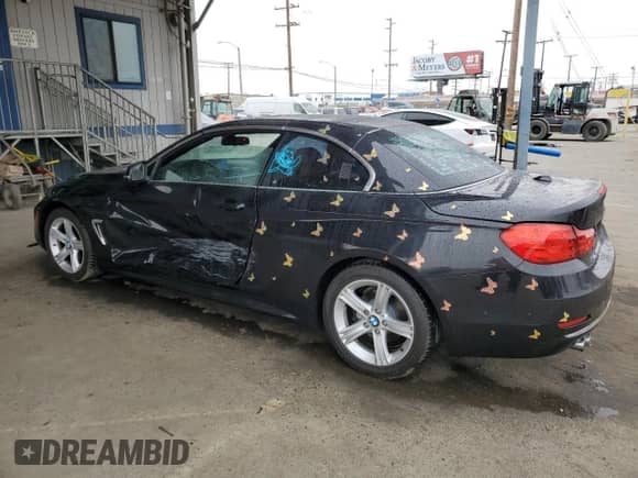 2015 BMW 4 Series 428i z VIN WBA3V5C52FP751617, wystawiony jako Copart lot #59394515 z przebiegiem 123 159 mil mil oraz Szkoda całkowita • Salvage title. Historia ofert i sprzedaży dostępna na DreamBid. Obrazek 2.