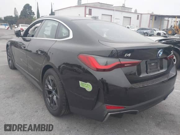 2023 BMW i4 eDrive35 with VIN WBY43AW04PFP93864, listed as a IAAI auction lot 42409885 with 19,758 mi miles and . Bid and sale history available at DreamBid. Image 3.