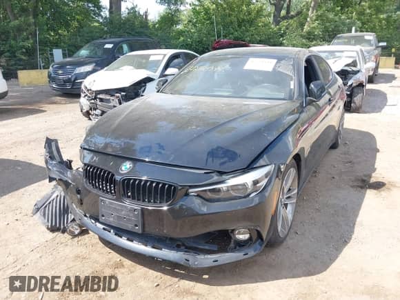 2018 BMW 4 Series 430i z VIN WBA4J1C51JBG77723, wystawiony jako IAAI lot #42724344 z przebiegiem 73 457 mil mil oraz . Historia ofert i sprzedaży dostępna na DreamBid. Obrazek 2.