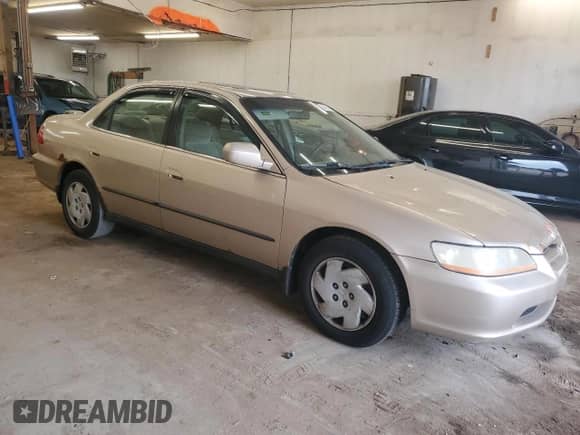 2000 Honda Accord LX z VIN 1HGCG1641YA038126, wystawiony jako Copart lot #64291435 z przebiegiem 195 689 mil mil oraz Szkoda całkowita • Salvage title. Historia ofert i sprzedaży dostępna na DreamBid. Obrazek 4.