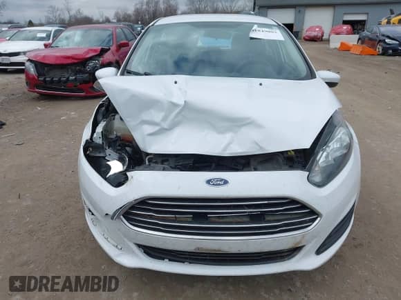 2017 Ford Fiesta S z VIN 3FADP4TJ2HM161814, wystawiony jako IAAI lot #41849003 z przebiegiem 107 836 mil mil oraz . Historia ofert i sprzedaży dostępna na DreamBid. Obrazek 12.