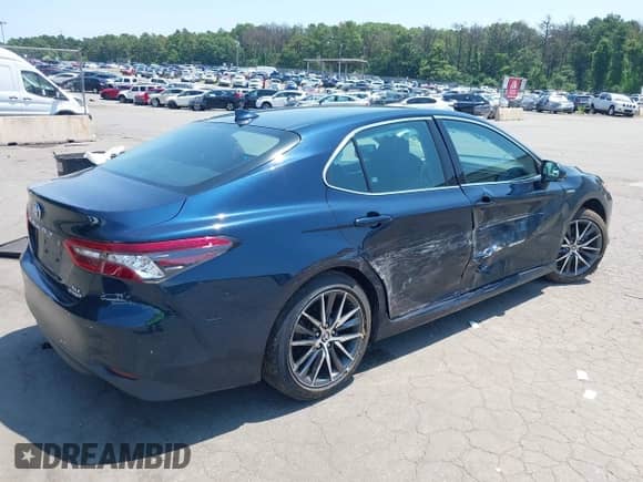 2021 Toyota Camry Hybrid XLE with VIN 4T1F31AK3MU554067, listed as a IAAI auction lot 42681018 with 53,630 mi miles and . Bid and sale history available at DreamBid. Image 4.