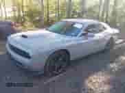 2021 Dodge Challenger GT z VIN 2C3CDZKG6MH564855, wystawiony jako IAAI lot #43380464 z przebiegiem 61 430 mil mil oraz . Historia ofert i sprzedaży dostępna na DreamBid. Obrazek 2.