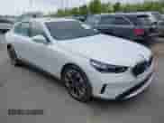 2024 BMW 5 Series 530i xDrive with VIN WBA53FJ03RCS25603, listed as a IAAI auction lot 42141231 with Not provided miles and . Bid and sale history available at DreamBid. Image 1.