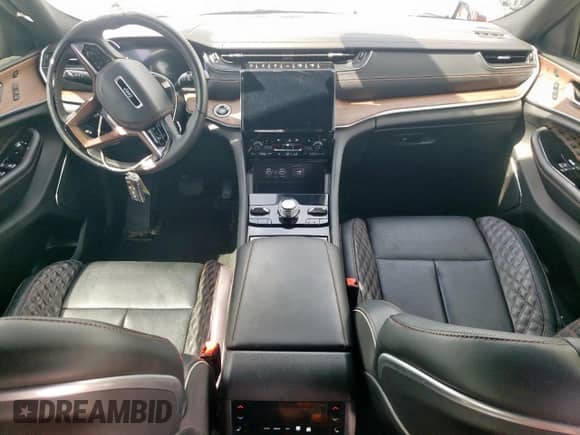 2023 Jeep Grand Cherokee Summit with VIN 1C4RJHEG2P8701370, listed as a Copart auction lot 60679055 with 20,154 mi miles and Salvage title. Bid and sale history available at DreamBid. Image 8.