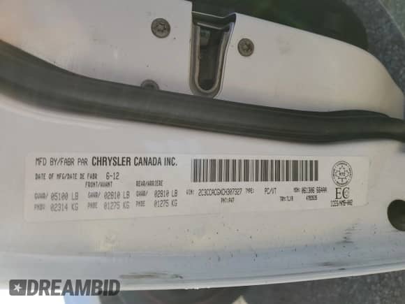 2012 Chrysler 300 Limited z VIN 2C3CCACGXCH307327, wystawiony jako Copart lot #82133095 z przebiegiem 226 977 mil mil oraz Szkoda całkowita • Salvage title. Historia ofert i sprzedaży dostępna na DreamBid. Obrazek 13.