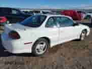 1996 Pontiac Grand Am с VIN 1G2NW12T1TC804543, выставлен на аукционе IAAI как лот 41590581 с пробегом 118 158 миль миль и . История ставок и продаж доступна на DreamBid. Изображение 4.