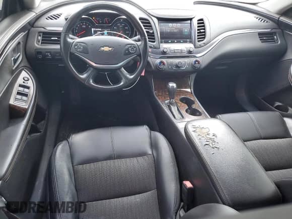 2014 Chevrolet Impala LT z VIN 2G1115SLXE9263933, wystawiony jako Copart lot #63345665 z przebiegiem 221 247 mil mil oraz Szkoda całkowita • Salvage title. Historia ofert i sprzedaży dostępna na DreamBid. Obrazek 8.