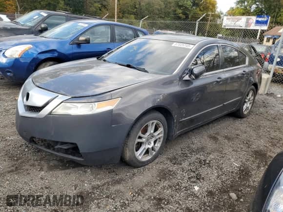 2009 Acura TL с VIN 19UUA86229A007420, выставлен на аукционе Copart как лот 87025745 с пробегом 264 927 миль миль и Списание • Salvage title. История ставок и продаж доступна на DreamBid. Изображение 1.