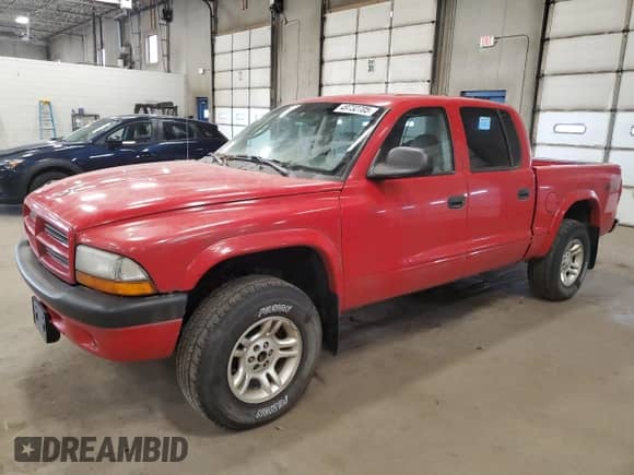 2003 Dodge Dakota Sport with VIN 1D7HG38N23S204989, listed as a Copart auction lot 49732705 with 190,921 mi miles and Non repairable. Bid and sale history available at DreamBid. Image 1.