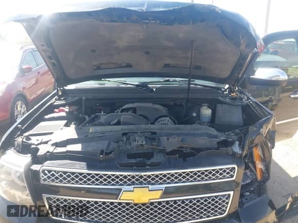 2009 Chevrolet Suburban LTZ z VIN 1GNFK36359R219818, wystawiony jako IAAI lot #42120323 z przebiegiem 146 999 mil mil oraz . Historia ofert i sprzedaży dostępna na DreamBid. Obrazek 10.