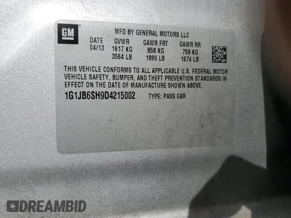2013 Chevrolet Sonic LS with VIN 1G1JB6SH9D4215002, listed as a Copart auction lot 42182225 with 124,253 mi miles and Salvage title. Bid and sale history available at DreamBid. Image 14.