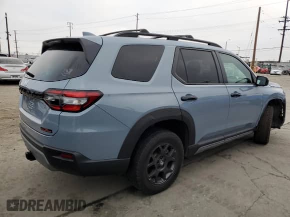 2023 Honda Pilot TrailSport с VIN 5FNYG1H64PB000379, выставлен на аукционе Copart как лот 90932525 с пробегом 38 388 миль миль и Списание • Salvage title. История ставок и продаж доступна на DreamBid. Изображение 3.