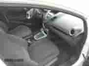 2015 Ford Fiesta SE with VIN 3FADP4BJ8FM126161, listed as a IAAI auction lot 43568274 with 138,715 mi miles and . Bid and sale history available at DreamBid. Image 5.