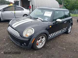 2009 MINI Hardtop with VIN WMWMF33539TW76329, listed as a IAAI auction lot 42512079 with 94,865 mi miles and . Bid and sale history available at DreamBid. Image 2.