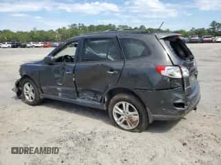 2012 Hyundai Santa Fe Limited с VIN 5XYZK3AB9CG134541, выставлен на аукционе Copart как лот 84774885 с пробегом 182 737 миль миль и На запчасти • Non repairable. История ставок и продаж доступна на DreamBid. Изображение 2.