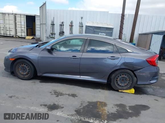 2016 Honda Civic LX z VIN 19XFC2F57GE204070, wystawiony jako IAAI lot #43375917 z przebiegiem 172 565 mil mil oraz . Historia ofert i sprzedaży dostępna na DreamBid. Obrazek 13.