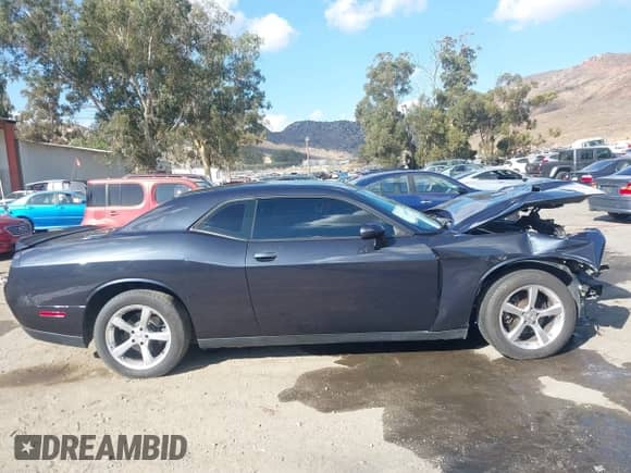 2019 Dodge Challenger SXT с VIN 2C3CDZAGXKH532019, выставлен на аукционе IAAI как лот 43369384 с пробегом 111 218 миль миль и . История ставок и продаж доступна на DreamBid. Изображение 14.