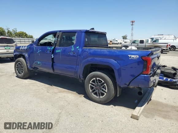 2024 Toyota Tacoma SR5 with VIN 3TMKB5FN4RM003206, listed as a Copart auction lot 64324035 with 8,012 mi miles and Salvage title. Bid and sale history available at DreamBid. Image 2.