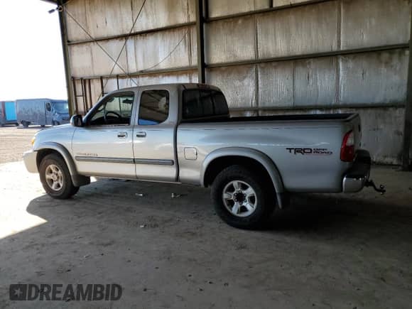 2005 Toyota Tundra SR5 z VIN 5TBRT34105S456421, wystawiony jako Copart lot #81968065 z przebiegiem 199 229 mil mil oraz Szkoda całkowita • Salvage title. Historia ofert i sprzedaży dostępna na DreamBid. Obrazek 2.