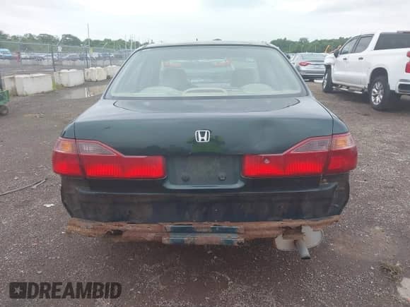 1999 Honda Accord EX with VIN JHMCG5658XC018777, listed as a IAAI auction lot 42761840 with 280,454 mi miles and . Bid and sale history available at DreamBid. Image 16.
