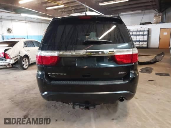 2013 Dodge Durango Crew with VIN 1C4RDJDG2DC670338, listed as a IAAI auction lot 42434949 with 176,202 mi miles and . Bid and sale history available at DreamBid. Image 17.