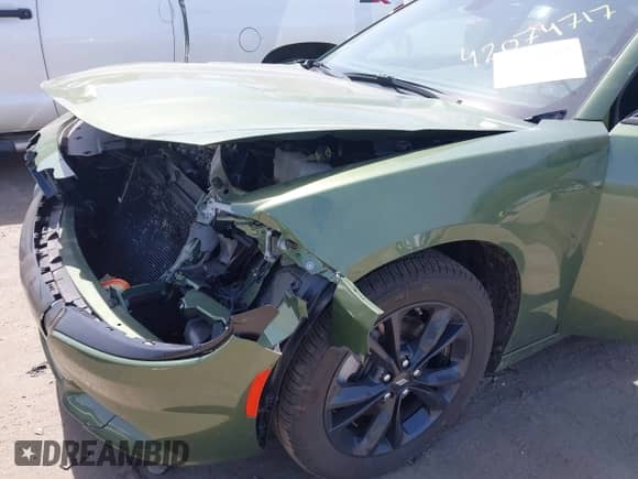 2023 Dodge Charger SXT with VIN 2C3CDXJGXPH675970, listed as a IAAI auction lot 42074717 with 5,930 mi miles and . Bid and sale history available at DreamBid. Image 17.