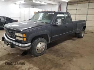 1993 GMC Sierra 1500 z VIN 1GTHC39F2PE543530, wystawiony jako Copart lot #83612804 z przebiegiem 200 011 mil mil oraz Czysty tytuł • Clean title. Historia ofert i sprzedaży dostępna na DreamBid. Obrazek 1.