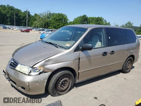 2004 Honda Odyssey LX with VIN 5FNRL18534B143388, listed as a Copart auction lot 68346135 with 160,563 mi miles and Salvage title. Bid and sale history available at DreamBid. Image 1.
