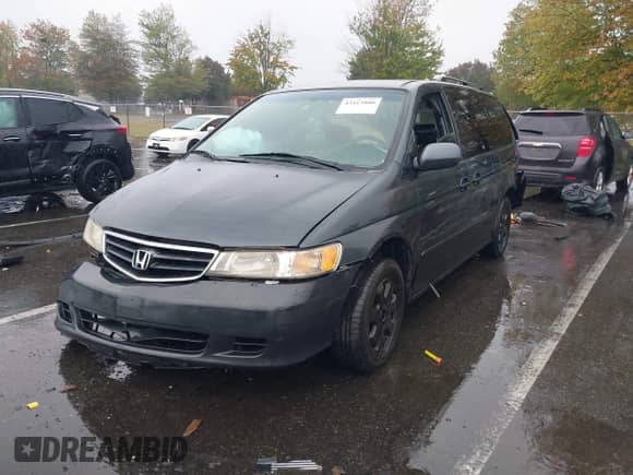 2003 Honda Odyssey EX z VIN 5FNRL18603B054627, wystawiony jako IAAI lot #43413800 z przebiegiem 201 434 mil mil oraz . Historia ofert i sprzedaży dostępna na DreamBid. Obrazek 2.