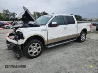 2013 Ford F-150 Lariat z VIN 1FTFW1ETXDKF90154, wystawiony jako Copart lot #80827015 z przebiegiem 174 701 mil mil oraz Szkoda całkowita • Salvage title. Historia ofert i sprzedaży dostępna na DreamBid. Obrazek 1.
