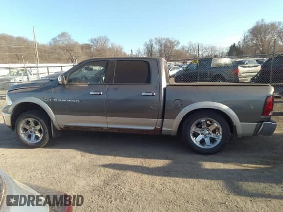 2011 Ram 1500 Big Horn with VIN 1D7RV1CT3BS710169, listed as a IAAI auction lot 41816546 with 141,551 mi miles and . Bid and sale history available at DreamBid. Image 14.