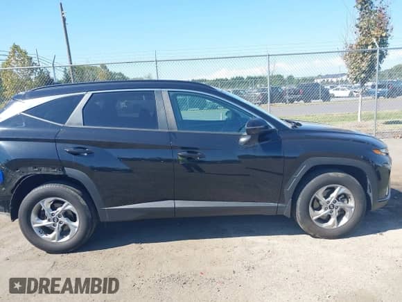 2023 Hyundai Tucson SEL with VIN 5NMJBCAE5PH186901, listed as a IAAI auction lot 43179572 with 46,590 mi miles and . Bid and sale history available at DreamBid. Image 13.
